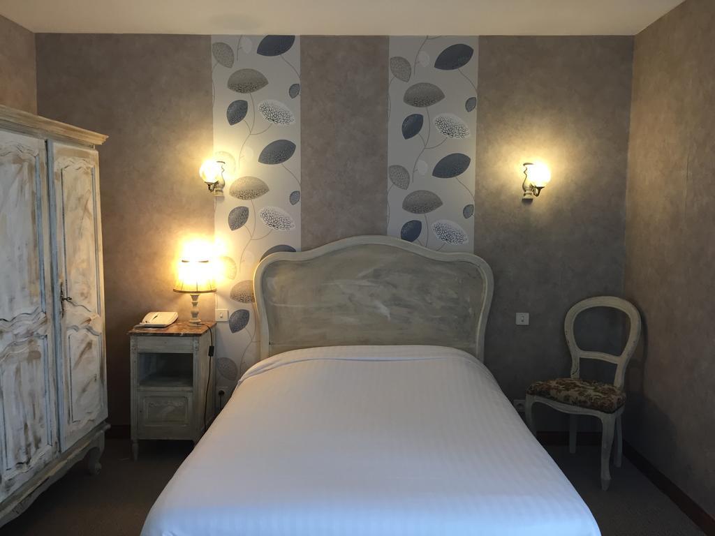 Hôtel Central Chaunay Quarto foto